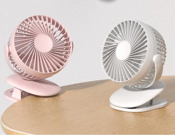 Mini USB rechargeable clip on fan, small personal cooling fan for office desk, baby stroller, camping, quiet operation
Compact portable fan with clip for tabletop use, dual color options for summer heat relief